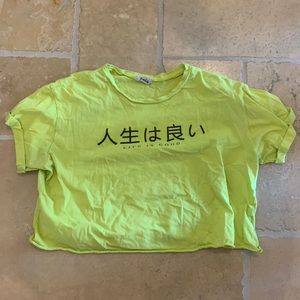 A cute yellow crop top in the brand local lab